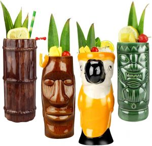 set of four colorful tall tiki mugs 