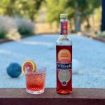 Wilfreds aperitif next to a non alcoholic spritz on a bocce court